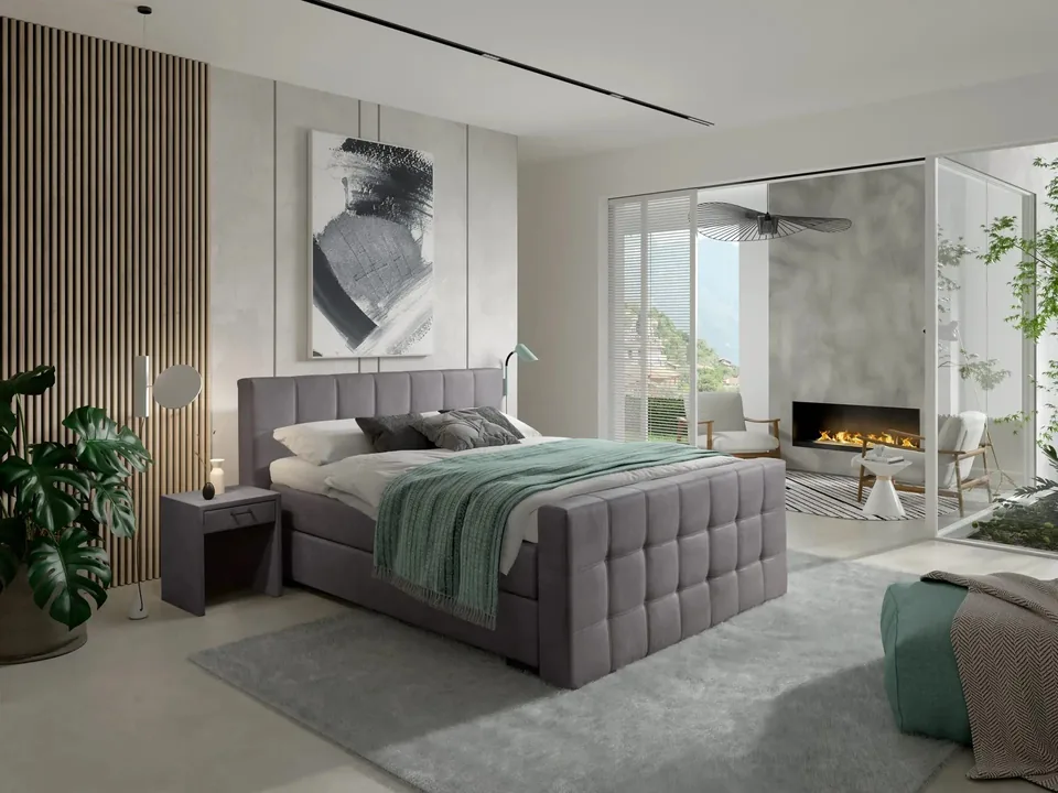 Grijze boxspring met hoofdbord, zelf samen te stellen in de configurator van Slaapstudio Eindhoven